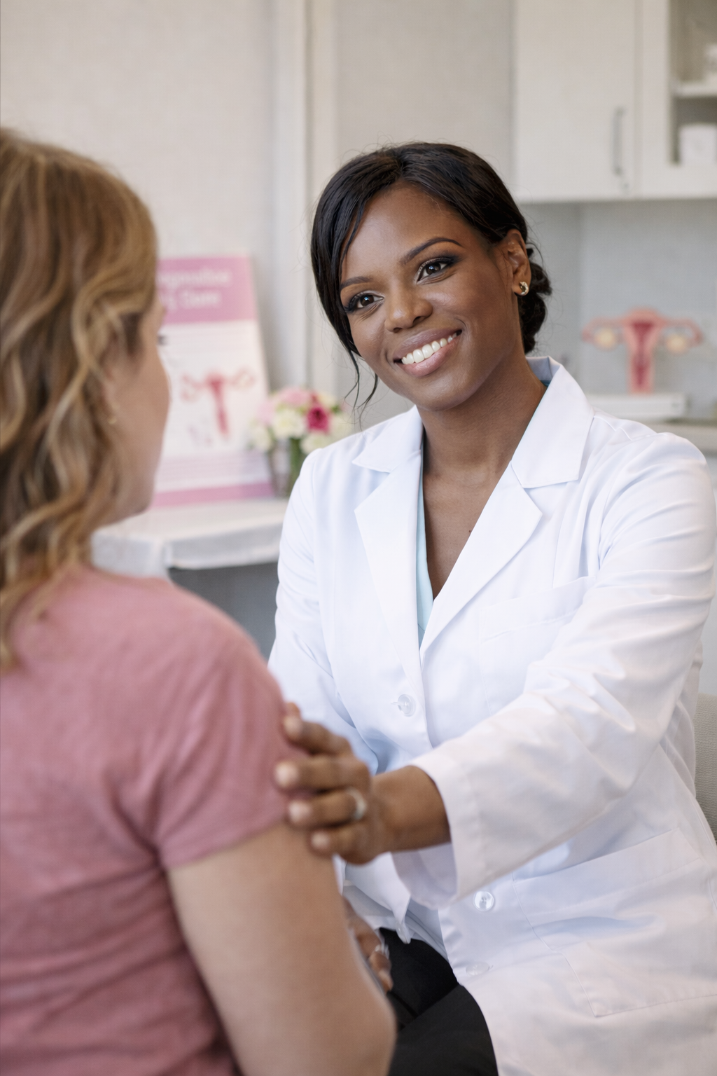 Jennifer Nwankwo with a patient at Nuvo Physio